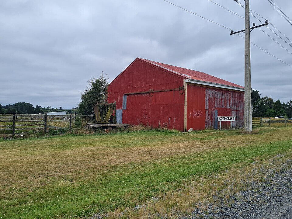 Rail Trail Concept Springbank Flag Station Site: A rural 'bus stop' for the rails. These modest shelters served the Oxford Branch, where a literal flag was used to signal the driver to stop for passengers or mail.